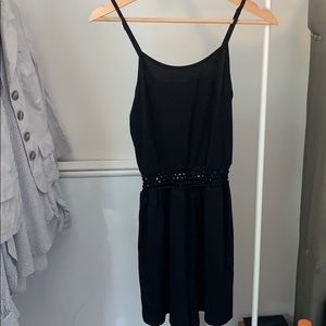 This brand new super cute black romper is a must!